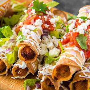 Chicken quesadillas on a wooden cutting board.