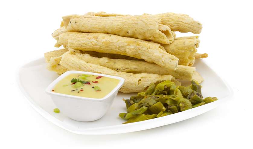 A white plate with food on it.